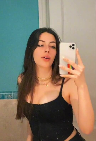 Sexy Shuli Morelli Shows Cleavage in Black Crop Top