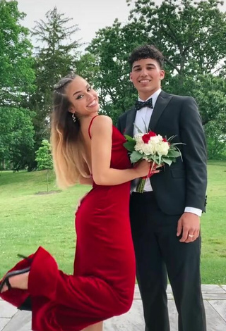 5. Sexy Grace Bressner Shows Cleavage in Red Dress
