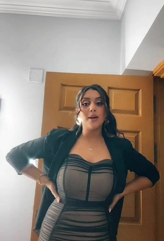 1. Sexy Haneen Magdi Shows Cleavage in Dress