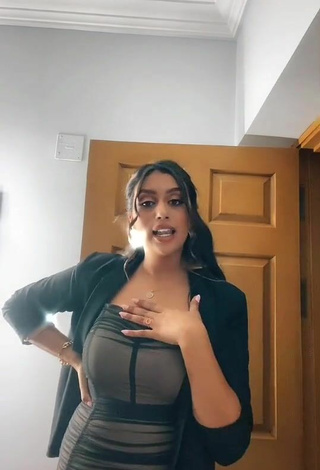 5. Sexy Haneen Magdi Shows Cleavage in Dress