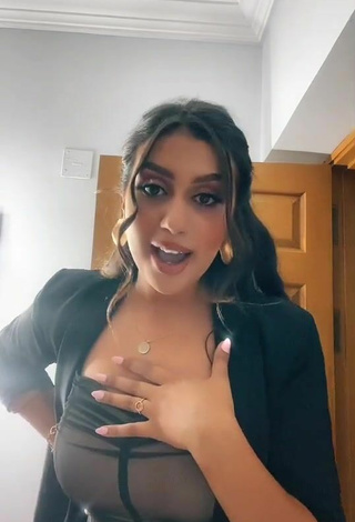 6. Sexy Haneen Magdi Shows Cleavage in Dress