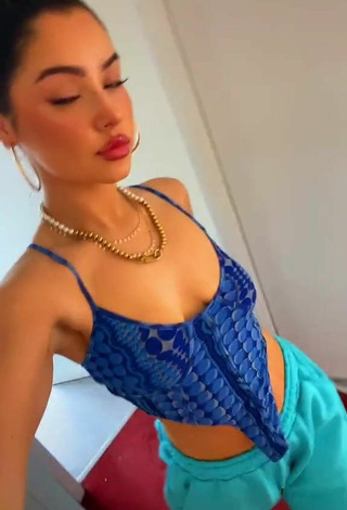 Cute Izzy Shea Shows Cleavage in Blue Crop Top
