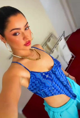 3. Cute Izzy Shea Shows Cleavage in Blue Crop Top
