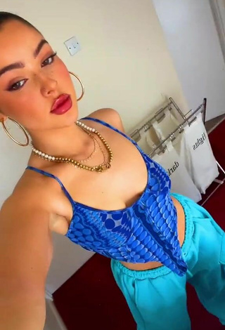 4. Cute Izzy Shea Shows Cleavage in Blue Crop Top