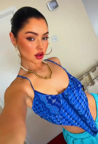 6. Cute Izzy Shea Shows Cleavage in Blue Crop Top