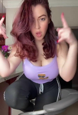 4. Sexy Jane Rocci Shows Cleavage in Purple Tank Top