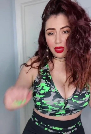 4. Hottie Jane Rocci Shows Cleavage in Camouflage Crop Top