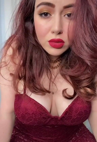 3. Sexy Jane Rocci Shows Cleavage in Red Bodysuit