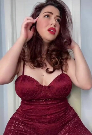 6. Sexy Jane Rocci Shows Cleavage in Red Bodysuit
