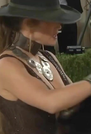 6. Hot JLo Shows Cleavage in Brown Dress