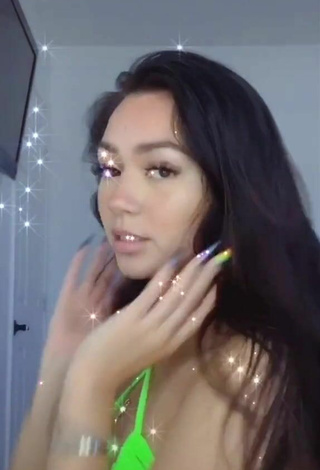 Hot Kailey Amora Shows Cleavage in Light Green Bikini Top