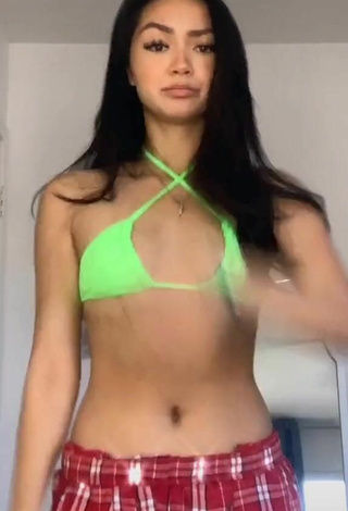 4. Sexy Kailey Amora Shows Cleavage in Light Green Bikini Top