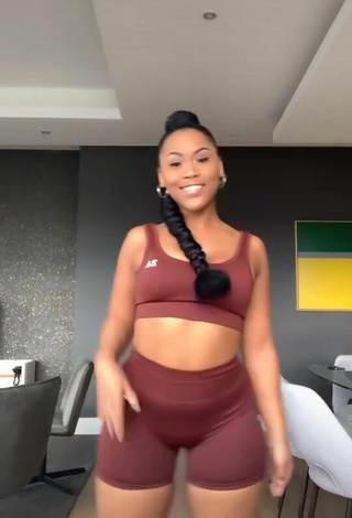 2. Lovely Lluvia Faye Shows Cleavage in Brown Crop Top