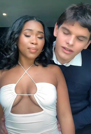2. Beautiful Lluvia Faye Shows Cleavage in Sexy White Dress
