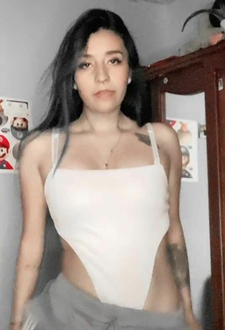Sexy Laura Narvaez Shows Cleavage in White Bodysuit
