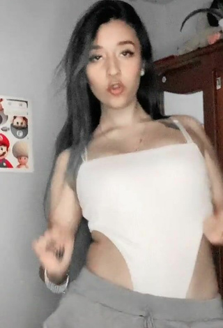 3. Sexy Laura Narvaez Shows Cleavage in White Bodysuit