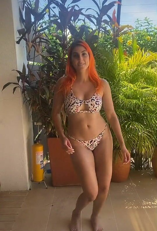 2. Sexy Lia Mendi Shows Cleavage in Leopard Bikini