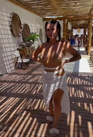 6. Sexy Luciana DelMar Shows Cleavage in Beige Bikini Top