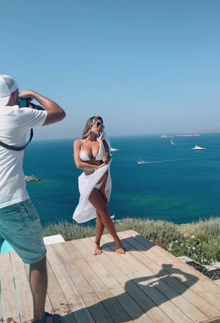 Hot Luciana DelMar Shows Cleavage in White Bikini in the Sea