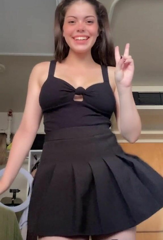 6. Sexy Madelyn Shows Cleavage in Black Dress