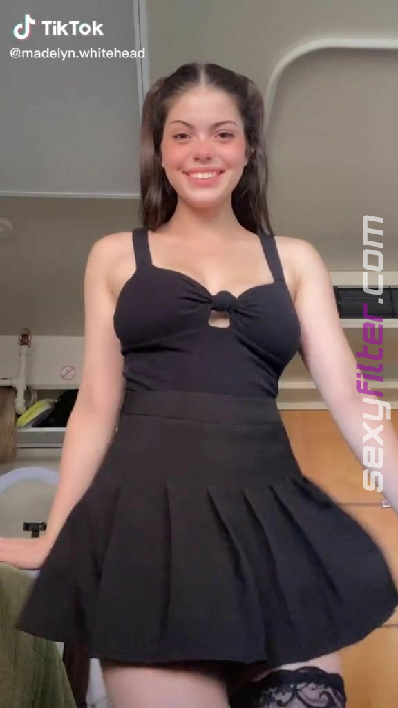 Sexy Madelyn Shows Cleavage In Black Dress