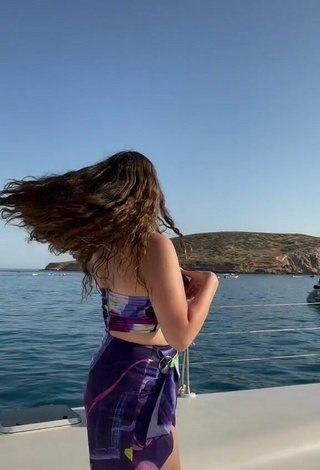 5. Hot Mariam Raidi Shows Cleavage in Bikini Top in the Sea