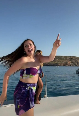 6. Hot Mariam Raidi Shows Cleavage in Bikini Top in the Sea