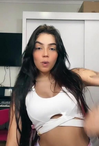 2. Beautiful Henny Shows Cleavage in Sexy White Crop Top