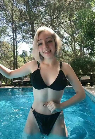 4. Cute Morena Cecilia Manenti de los Ríos Shows Cleavage in Black Bikini at the Pool