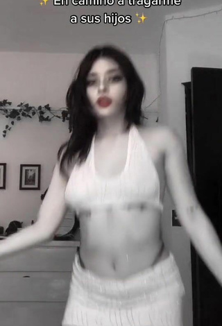 2. Sexy Pantograma Shows Cleavage in White Crop Top