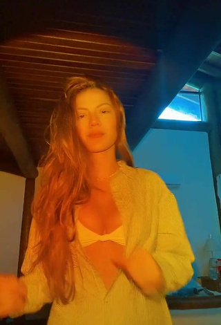 1. Sexy Sarah Poncio Shows Cleavage in White Bikini Top