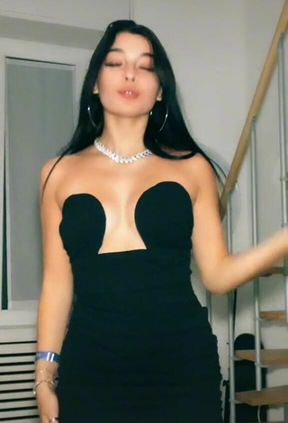 Sexy Sofia Crisafulli Shows Cleavage in Black Dress