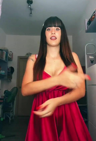 5. Breathtaking Alice Iori Shows Cleavage in Red Dress