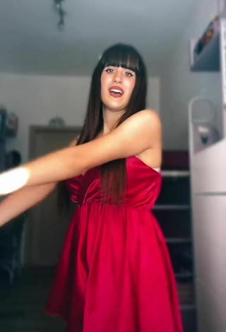 6. Pretty Alice Iori Shows Cleavage in Red Dress