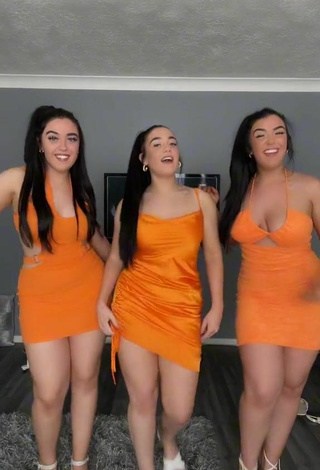 4. Sexy Terrytriplets Shows Cleavage in Orange Dress and Bouncing Boobs