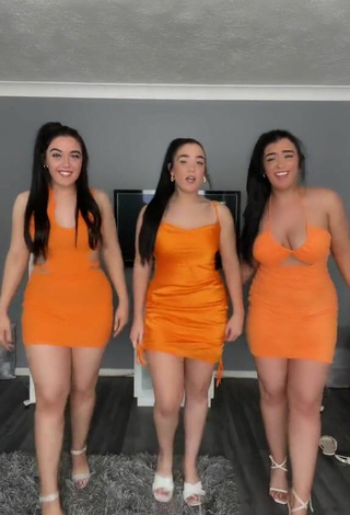 5. Sexy Terrytriplets Shows Cleavage in Orange Dress and Bouncing Boobs