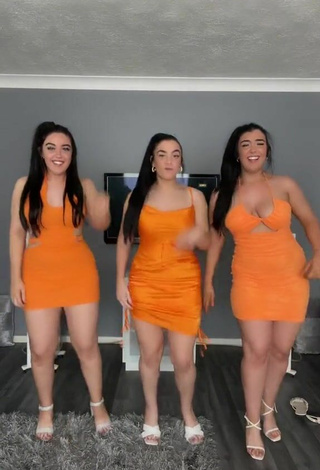 6. Sexy Terrytriplets Shows Cleavage in Orange Dress and Bouncing Boobs