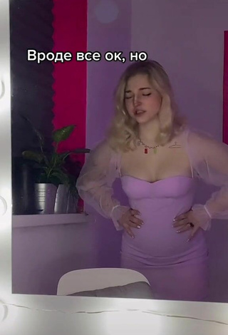 2. Sexy Veronika Dmitriieva Shows Cleavage in Purple Dress