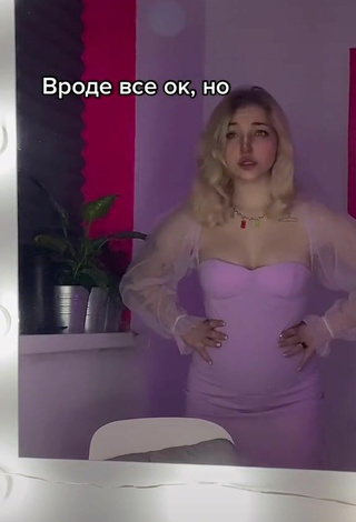 4. Sexy Veronika Dmitriieva Shows Cleavage in Purple Dress