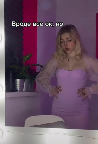 5. Sexy Veronika Dmitriieva Shows Cleavage in Purple Dress