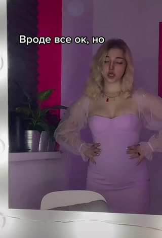6. Sexy Veronika Dmitriieva Shows Cleavage in Purple Dress