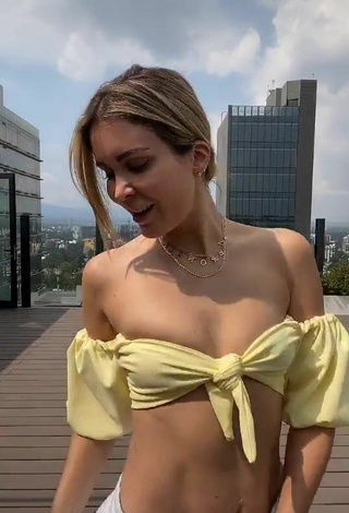 2. Sweetie Verónica Montes Shows Cleavage in Yellow Crop Top