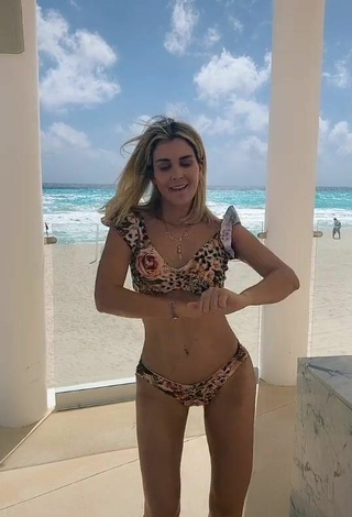 6. Sweetie Verónica Montes Shows Cleavage in Leopard Bikini at the Beach