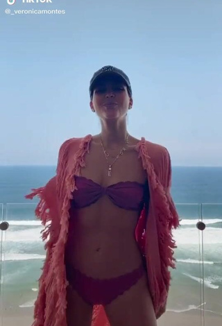 2. Cute Verónica Montes Shows Cleavage in Purple Bikini