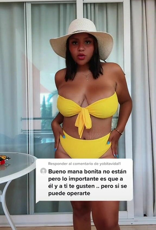 Cute Adelaida Tassoni Shows Cleavage in Yellow Bikini