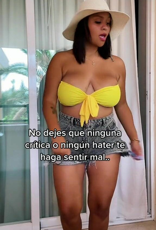 2. Beautiful Adelaida Tassoni Shows Cleavage in Sexy Yellow Bikini Top and Bouncing Tits