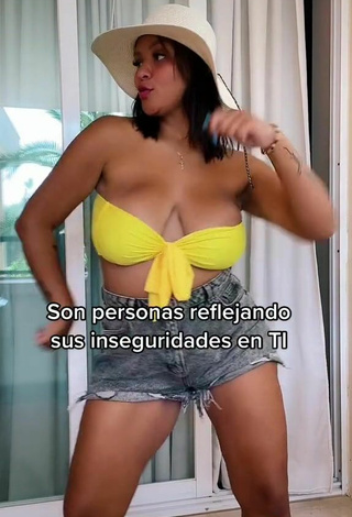 6. Beautiful Adelaida Tassoni Shows Cleavage in Sexy Yellow Bikini Top and Bouncing Tits