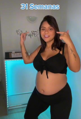 4. Sexy Adelaida Tassoni Shows Cleavage in Black Crop Top
