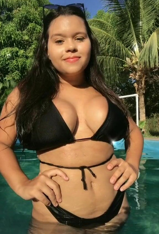 Attractive Allana Vasconcelos Shows Cleavage in Black Bikini at the Pool