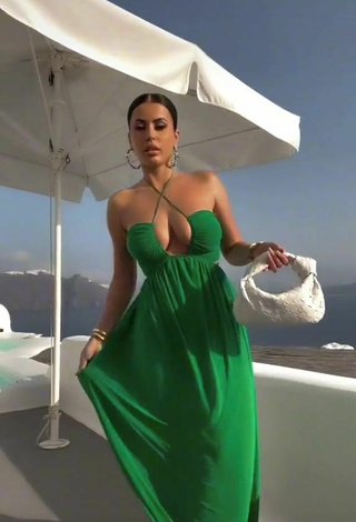 2. Hot Amra Olevic Shows Cleavage in Green Dress